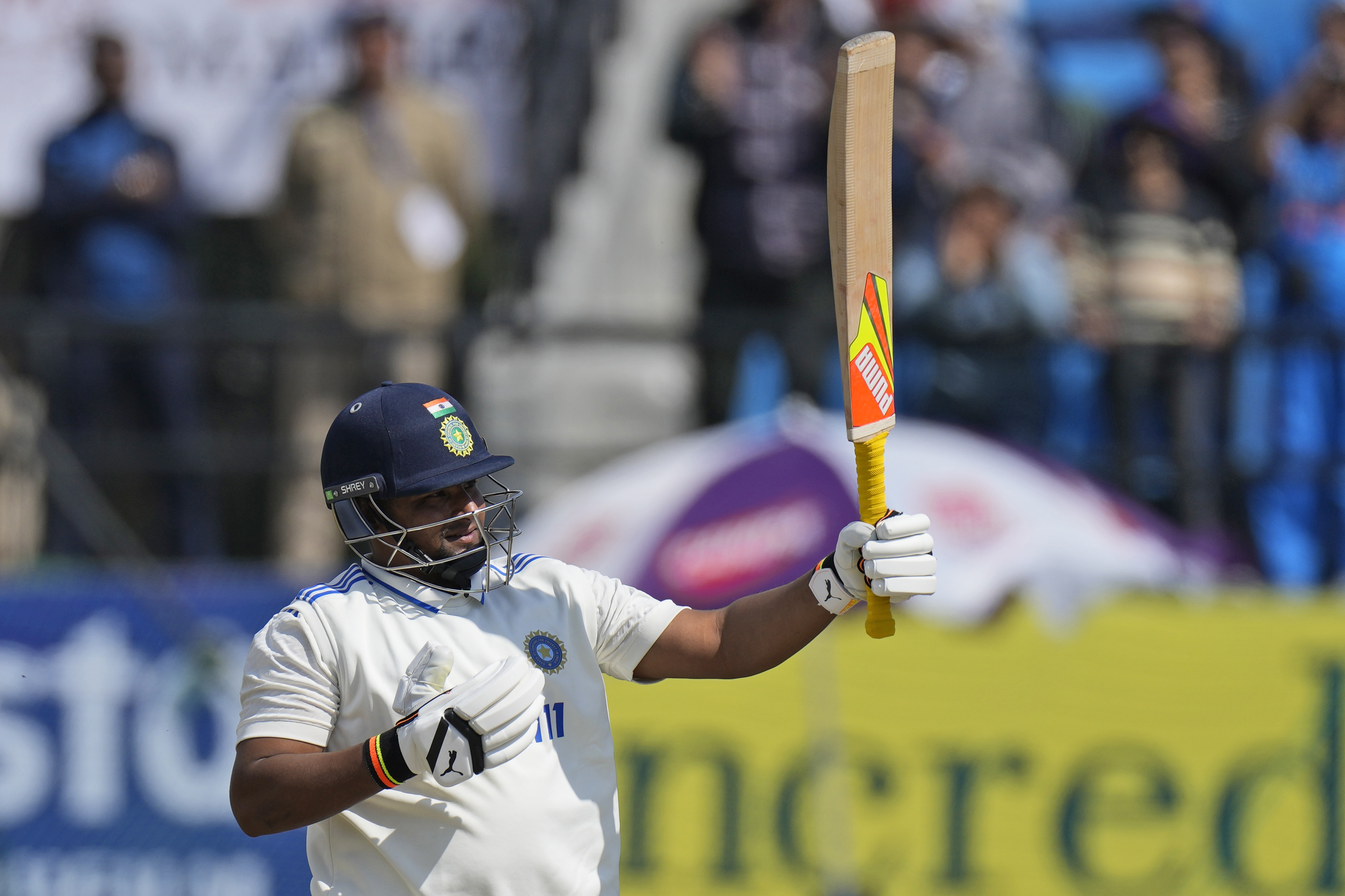 India’s Sarfaraz Khan celebrates his half-century (Ashwini Bhatia/AP)