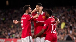 Marcus Rashford is congratulated by his Manchester United team-mates