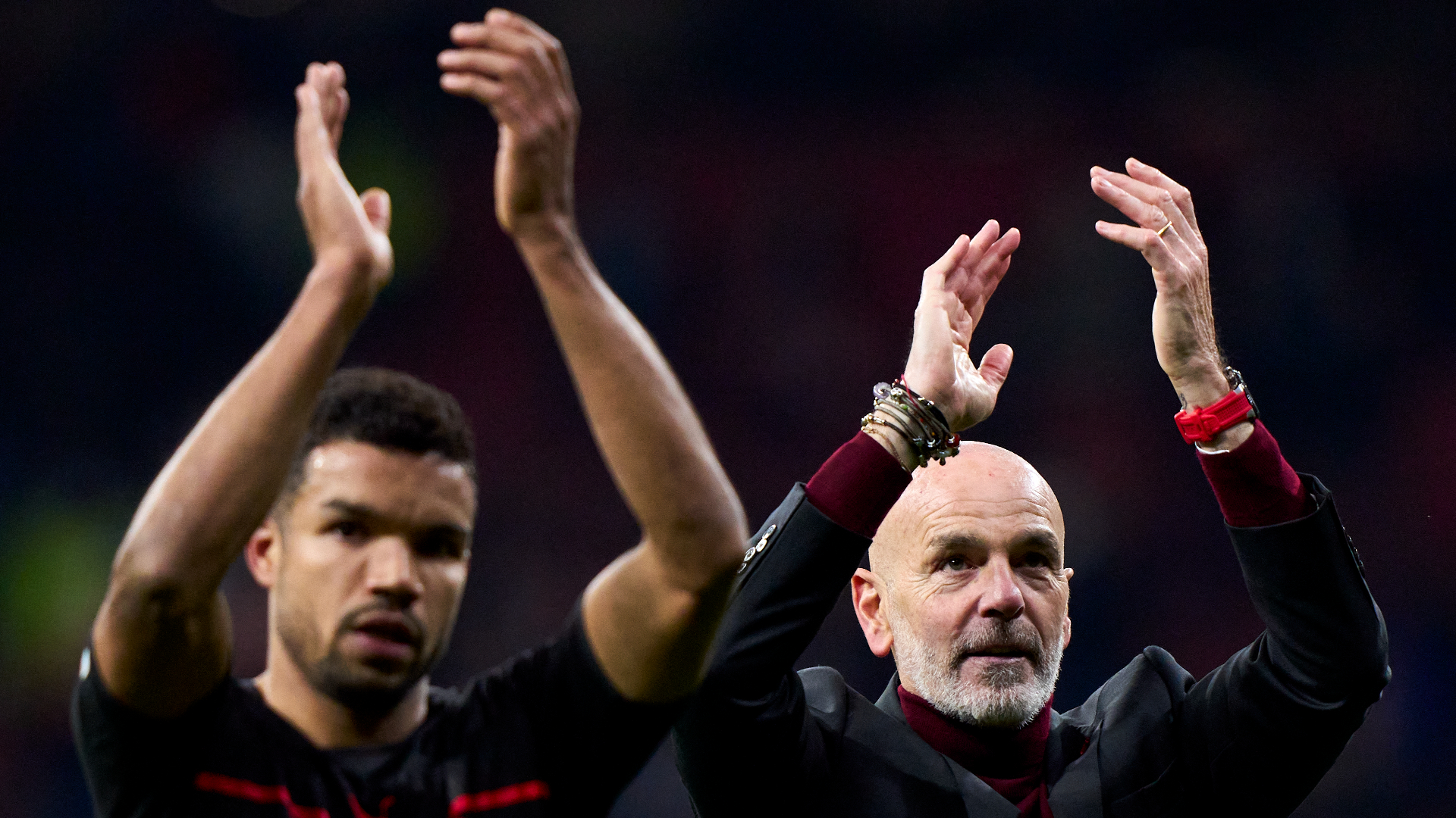 Milan's Junior Messias and Stefano Pioli