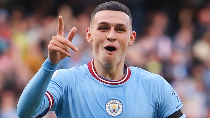Phil Foden celebrates a derby goal for Manchester City
