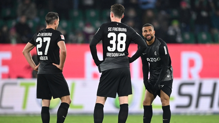 Freiburg's players look dejected against Wolfsburg