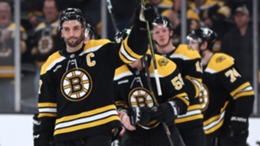 Patrice Bergeron of the Boston Bruins acknowledges the fans