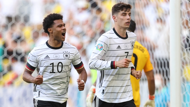 Chelsea ace Kai Havertz (right) has impressed for Germany