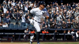 Aaron Judge of the New York Yankees hits a home run during the first inning against the San Francisco Giants on Opening Day