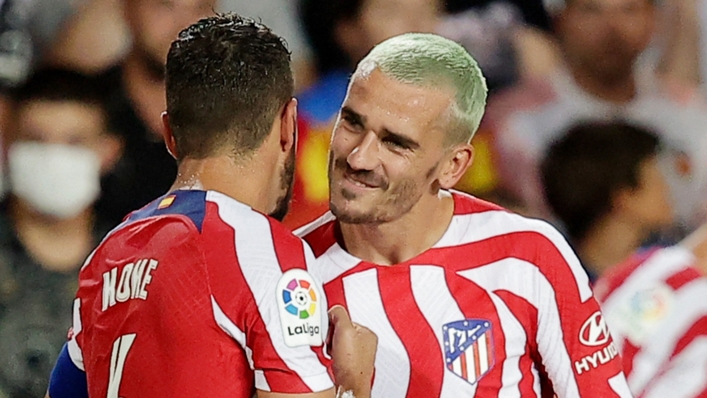 Antoine Griezmann (right) celebrates his winning goal