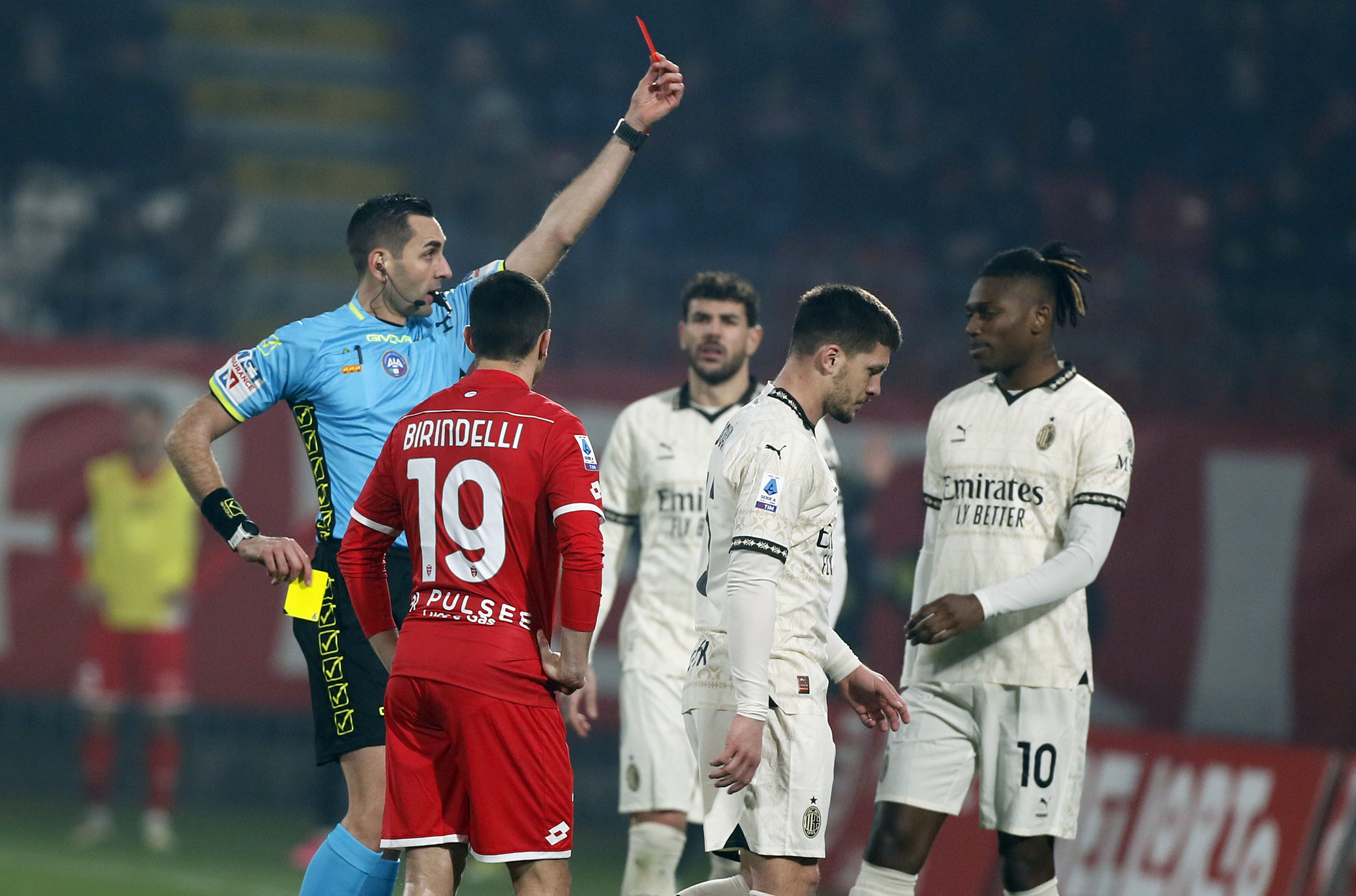 Milan’s Luka Jovic (second right) receives a red card
