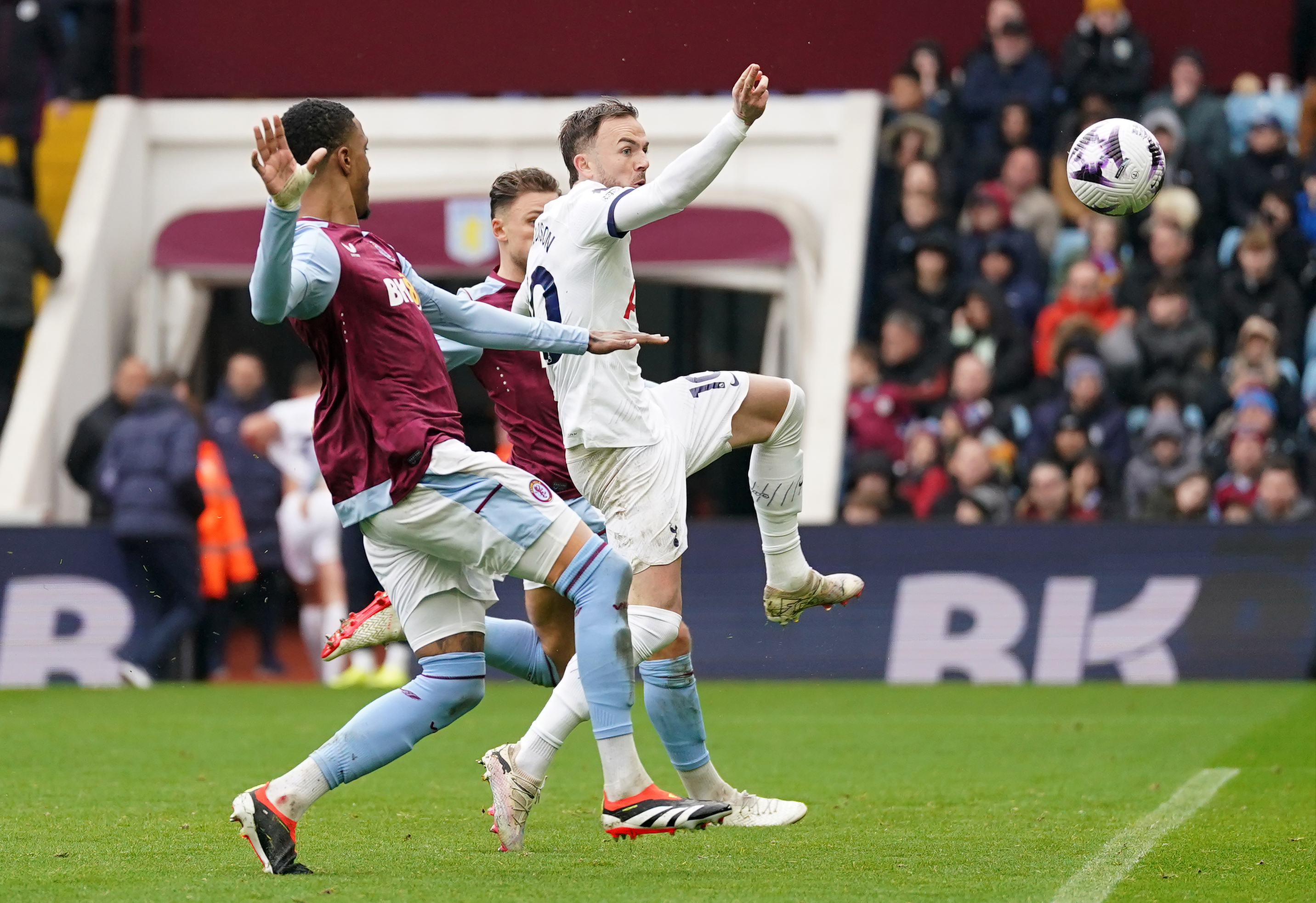 James Maddison, right, scores Tottenham's first goal