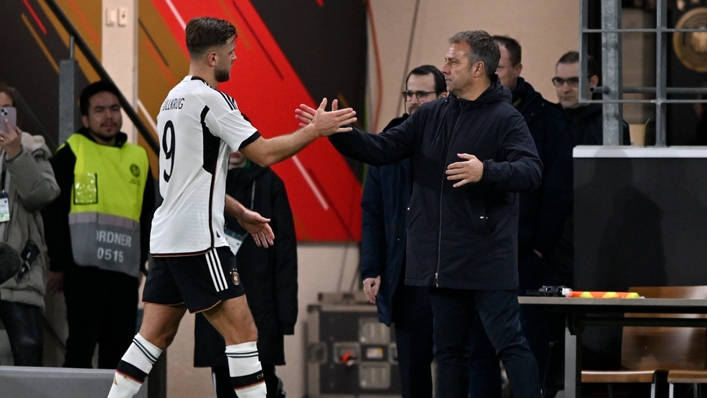 Niclas Fullkrug and Germany coach Hansi Flick