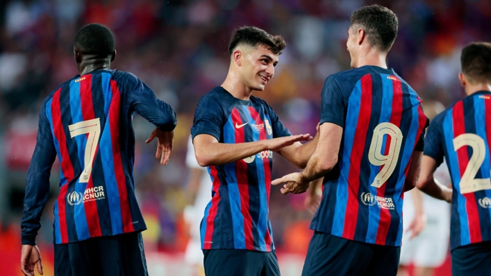 Pedri celebrates with Robert Lewandowski during Barcelona's 6-0 win over Pumas UNAM at Camp Nou