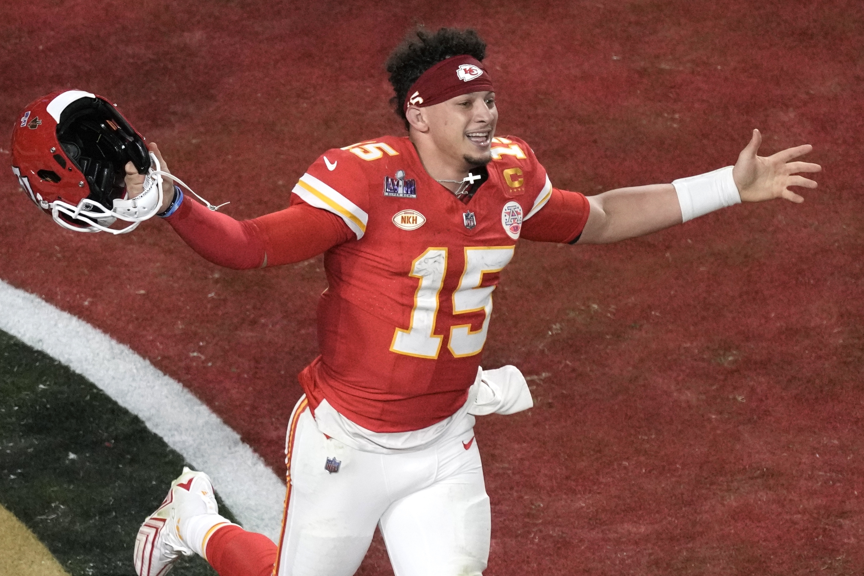 Kansas City Chiefs quarterback Patrick Mahomes (15) celebrates their win in overtime