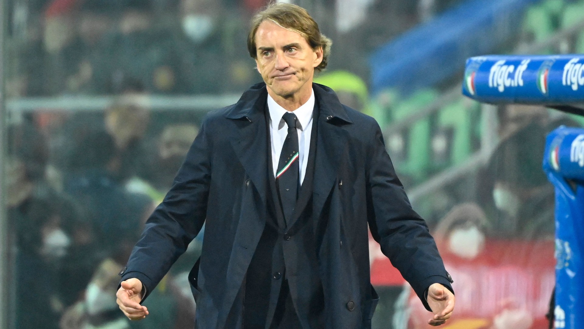 Mancini looks on at Renzo Barbera