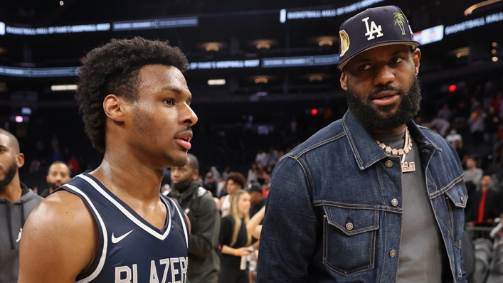 Bronny James of the Sierra Canyon Trailblazers and father LeBron James of the Los Angeles Lakers walk off the court
