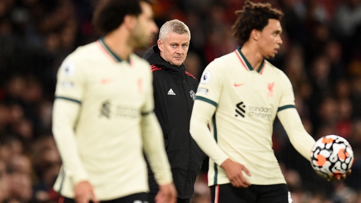 Ole Gunnar Solskjaer (C) presided over a 5-0 home loss to Liverpool