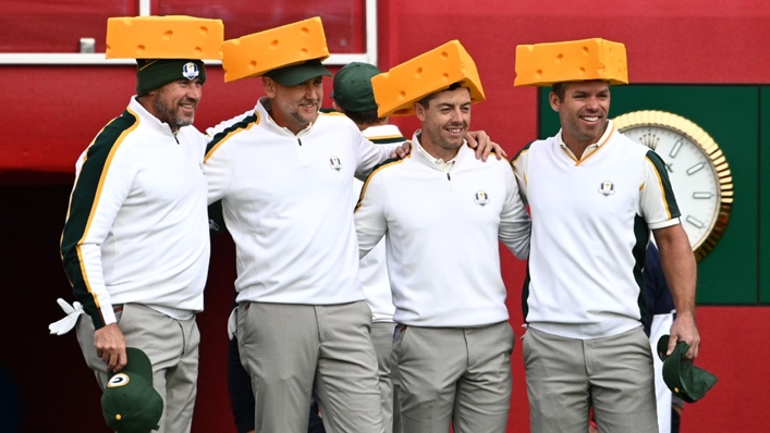 Europe’s Lee Westwood, Ian Poulter, Rory McIlroy and Paul Casey (left-right) arrive on the first tee wearing Green Bay Packers Cheesehead hats in practice ahead of the Ryder Cup (PA Archive)