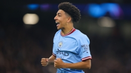 Rico Lewis celebrates after scoring on his full debut for Manchester City