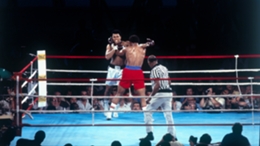 Muhammad Ali fights George Foreman in the Rumble in the Jungle