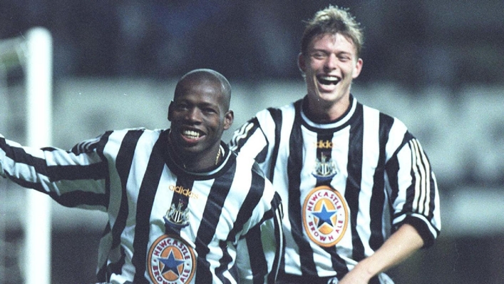 Jon Dahl Tomasson (right) congratulates hat-trick hero Faustino Asprilla during the 3-2 Champions League victory over Barcelona (Owen Humphreys/PA)