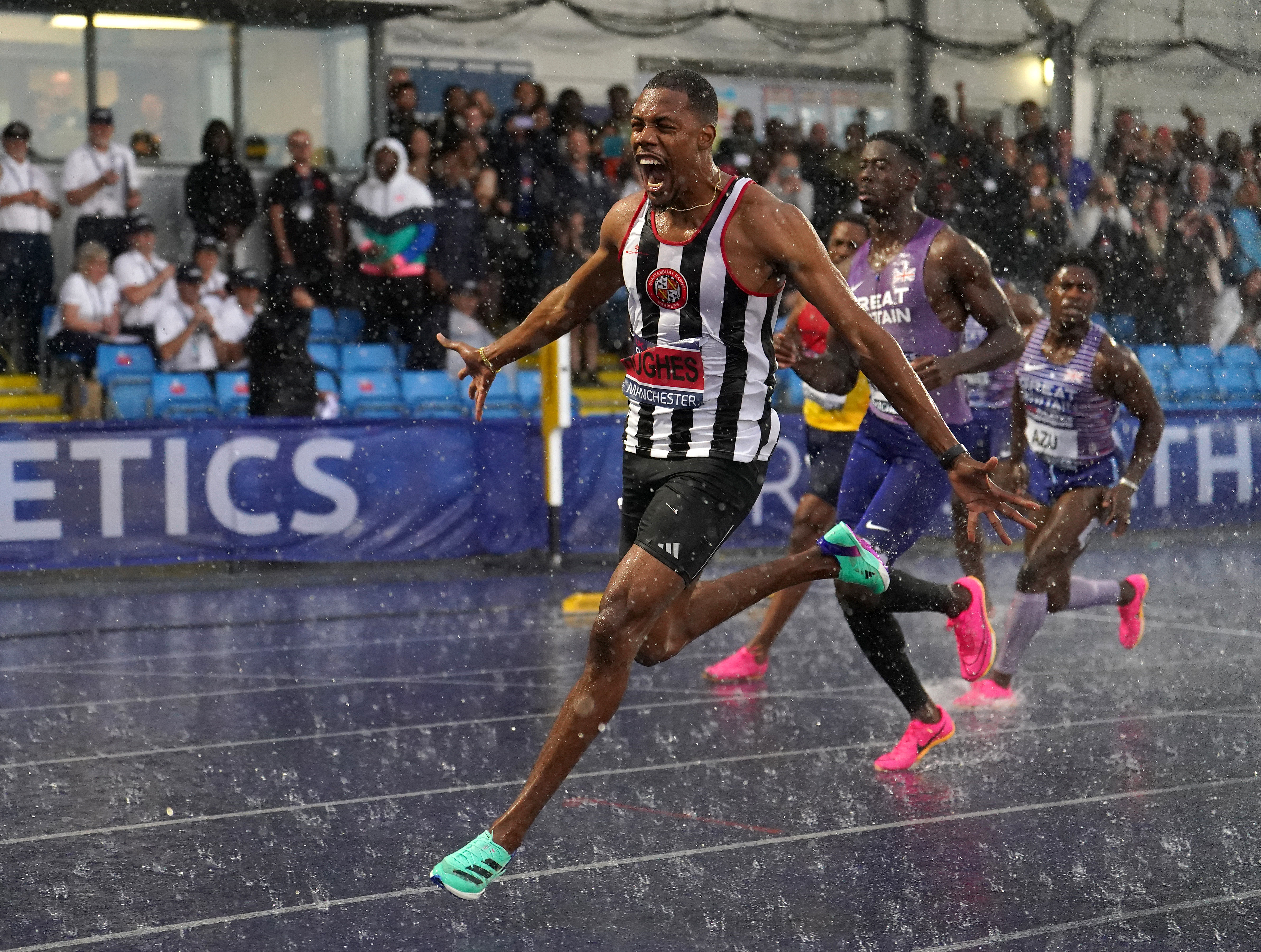 Zharnel Hughes wins the men's 100 metres at the British Championships in Manchester (Martin Rickett/PA)