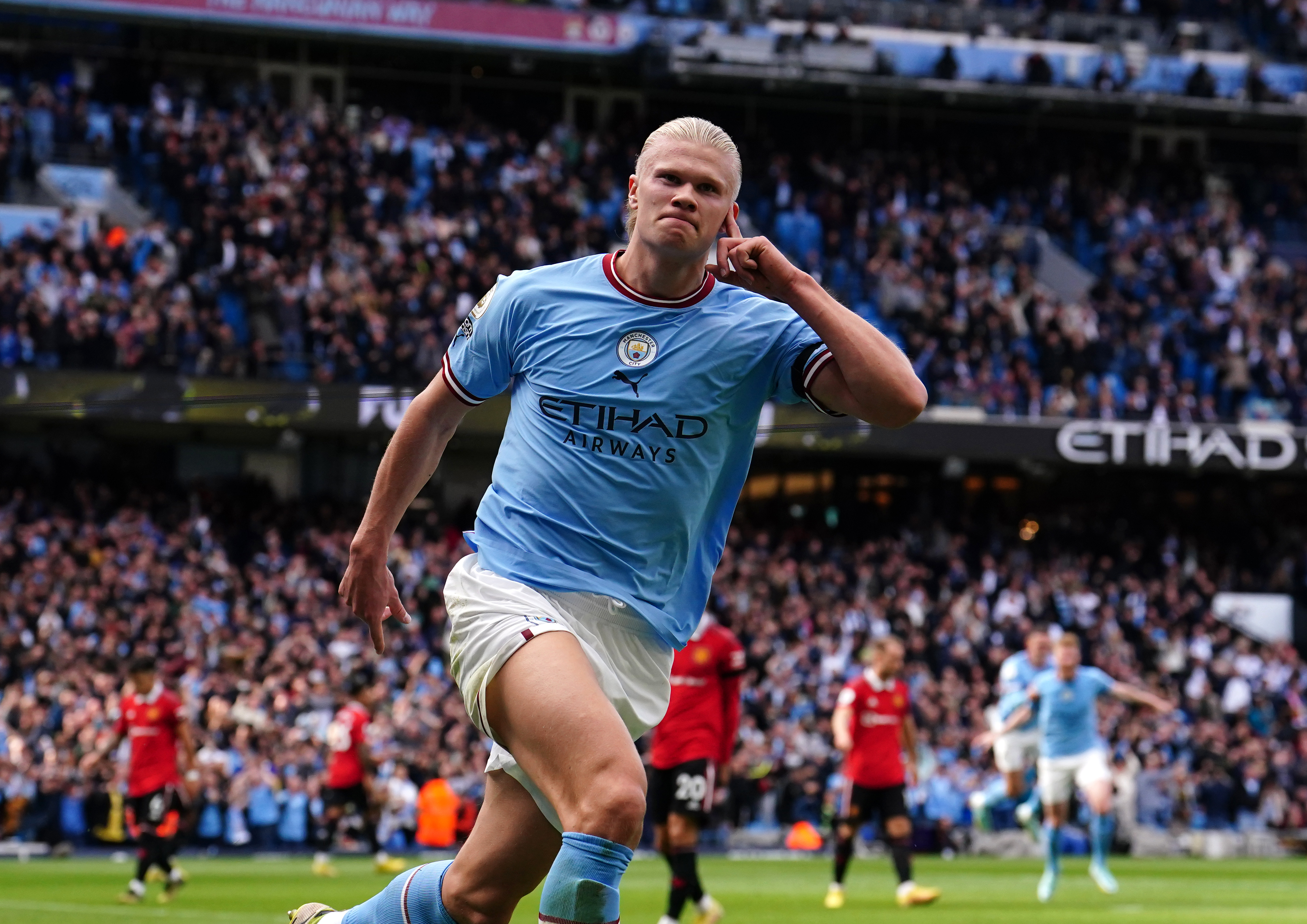 Erling Haaland celebrates scoring against Manchester United last season