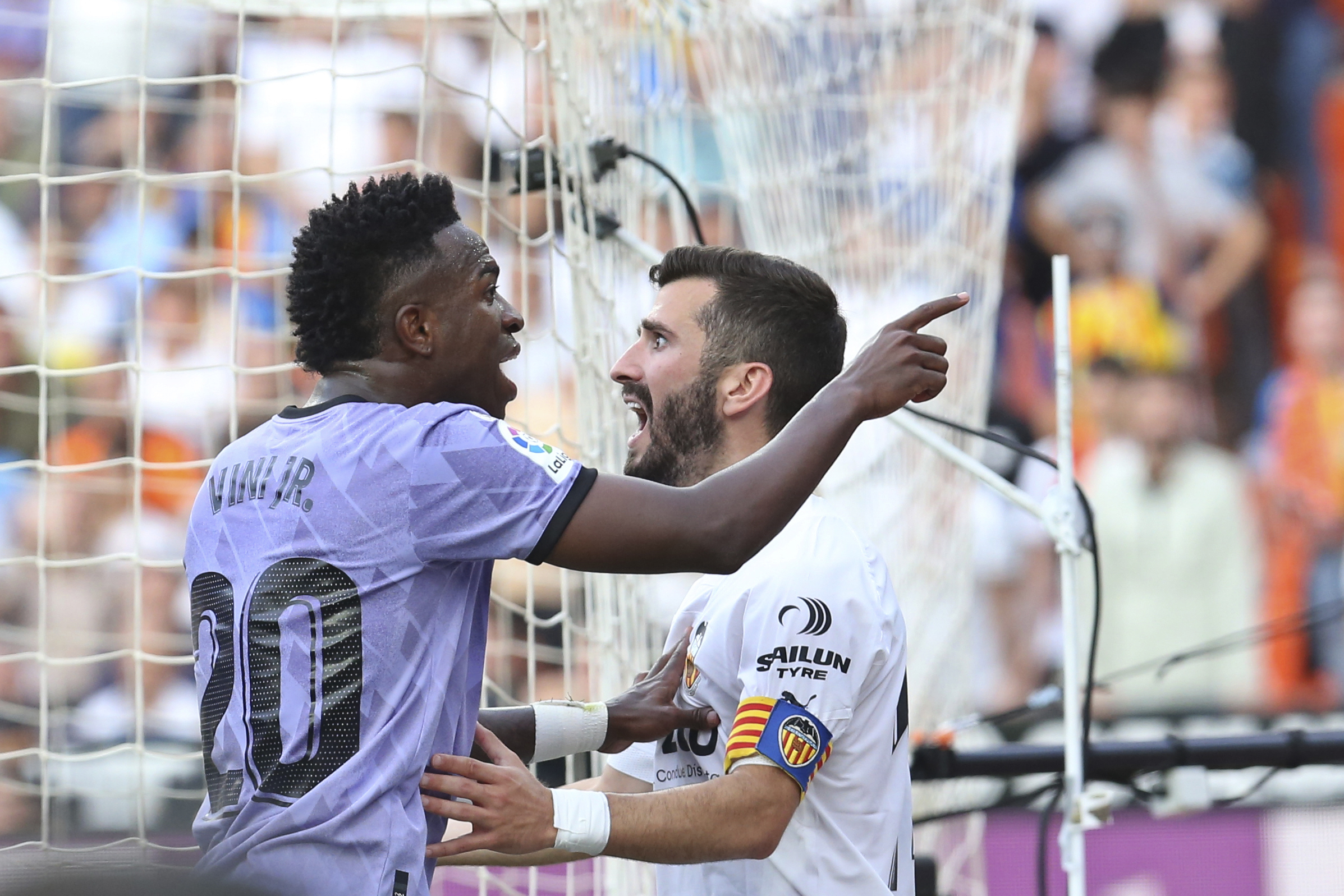 Vinicius Junior, left, confronts Valencia fans on Sunday