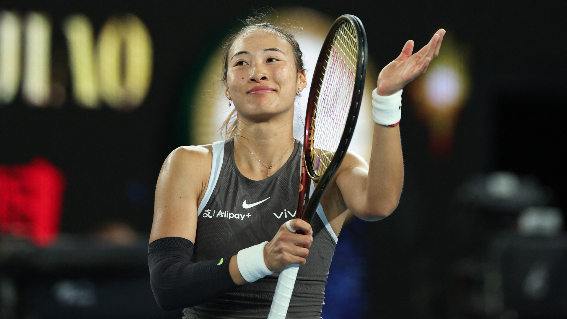 Australian Open: Zheng gets up and running with tough win over Todoni
