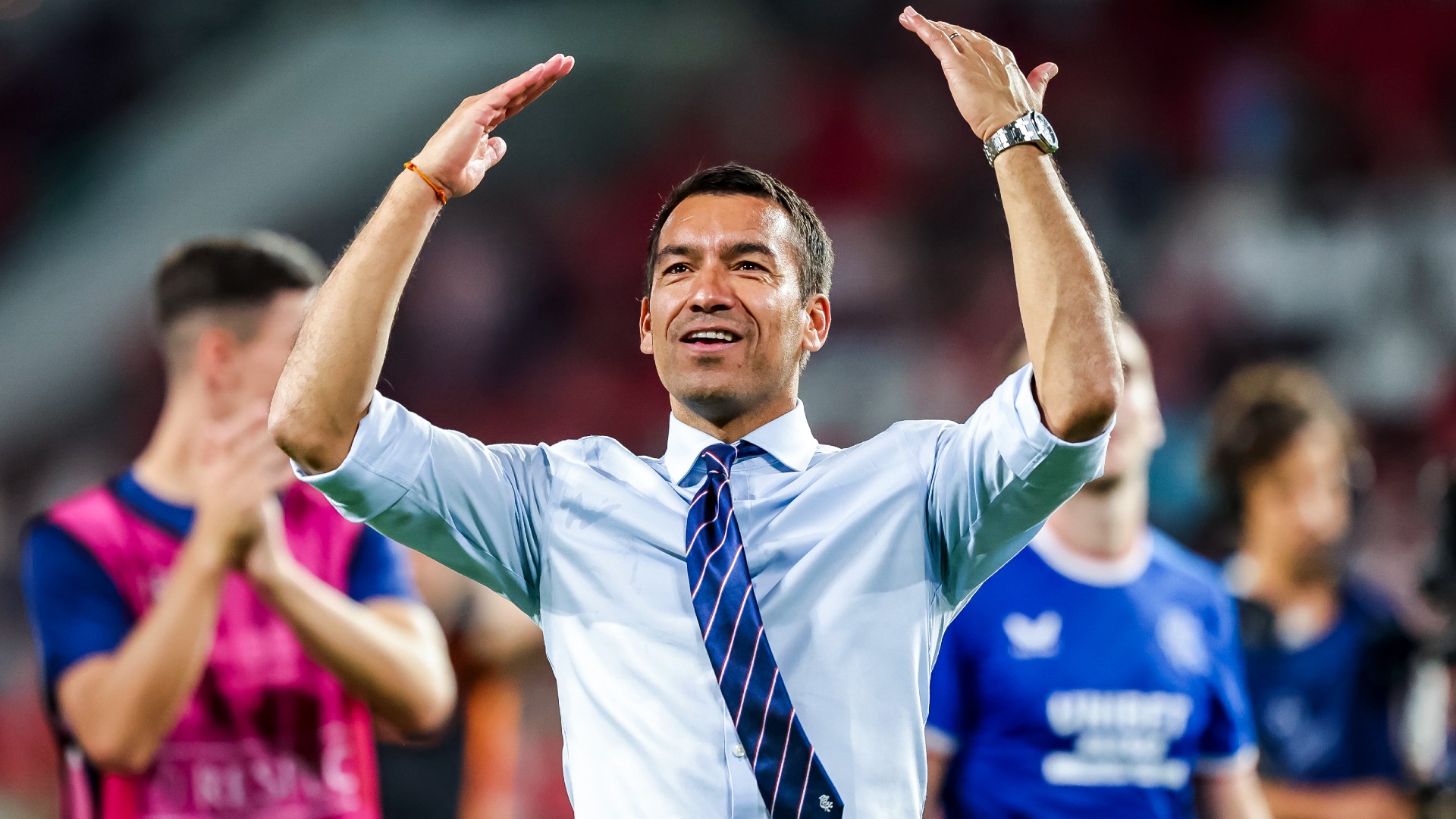 Van Bronckhorst celebrates Rangers' win in Eindhoven