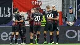 Milan celebrate Alexis Saelemaekers' goal at Salzburg