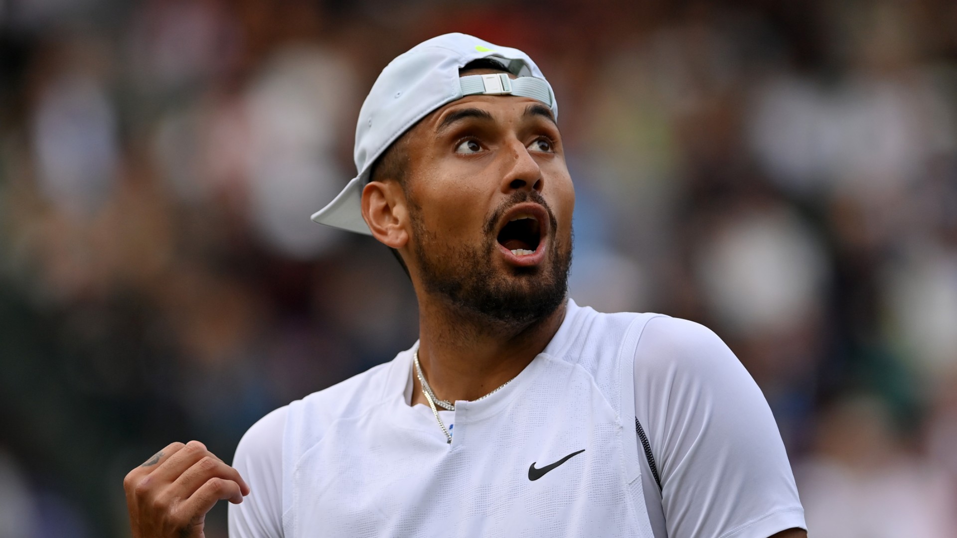 Nick Kyrgios argues with the umpire during Saturday's match against Stefanos Tsitsipas