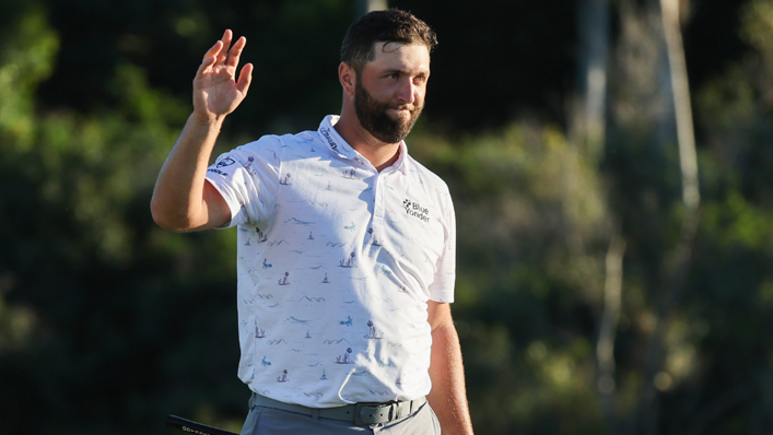 Jon Rahm of Spain reacts after putting to tie the course record with a 61 on the 18th green during the third round of the Sentry Tournament of Champions