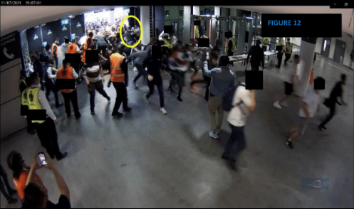 Supporters force open an emergency fire door to force entry to Wembley at the Euro 2020 final