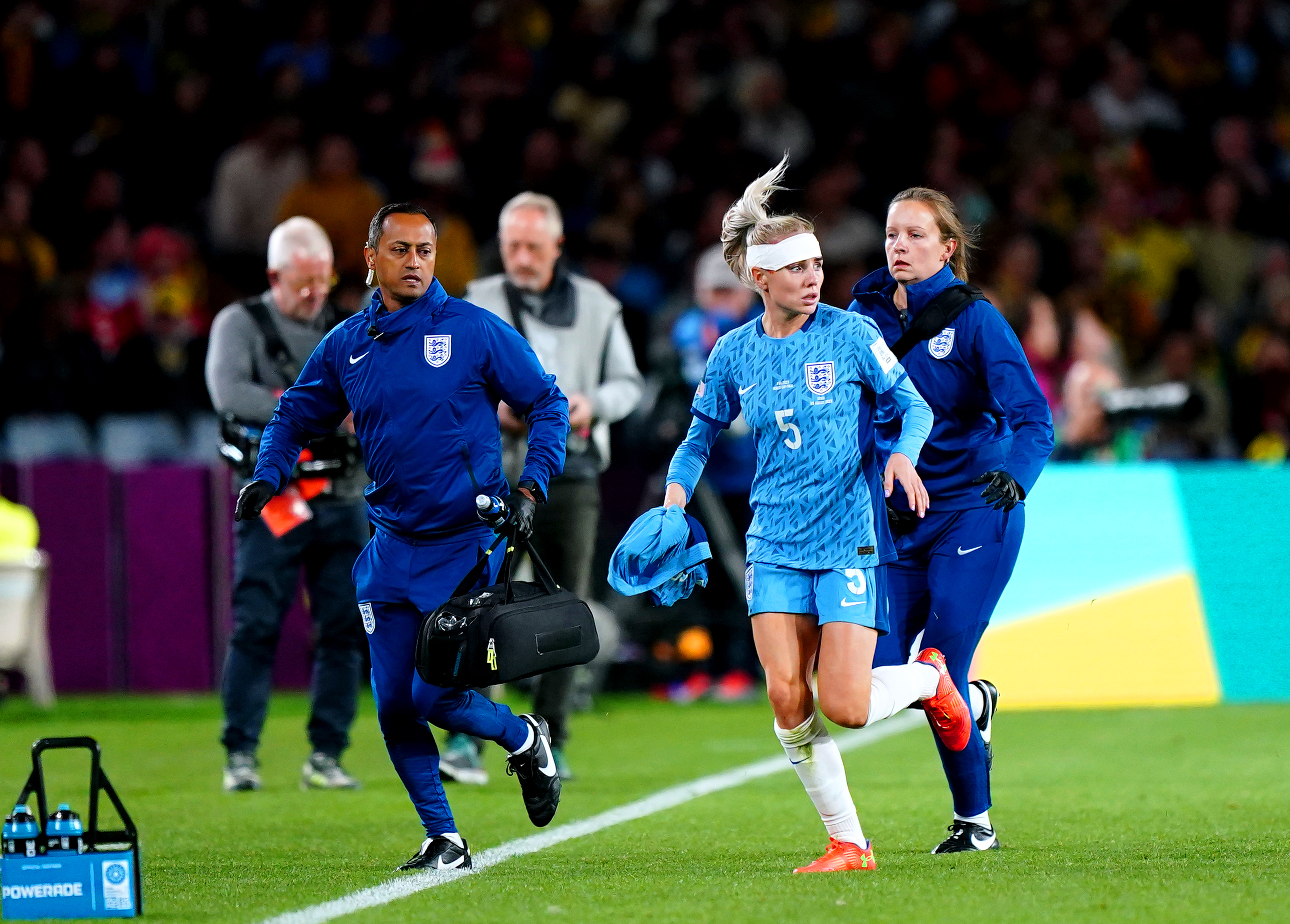 Alex Greenwood suffered a head wound but was quickly back in action