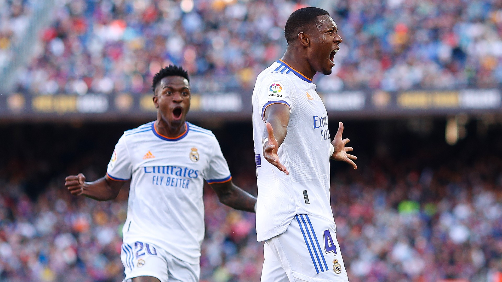 David Alaba and Vinicius Junior celebrate his goal against Barcelona