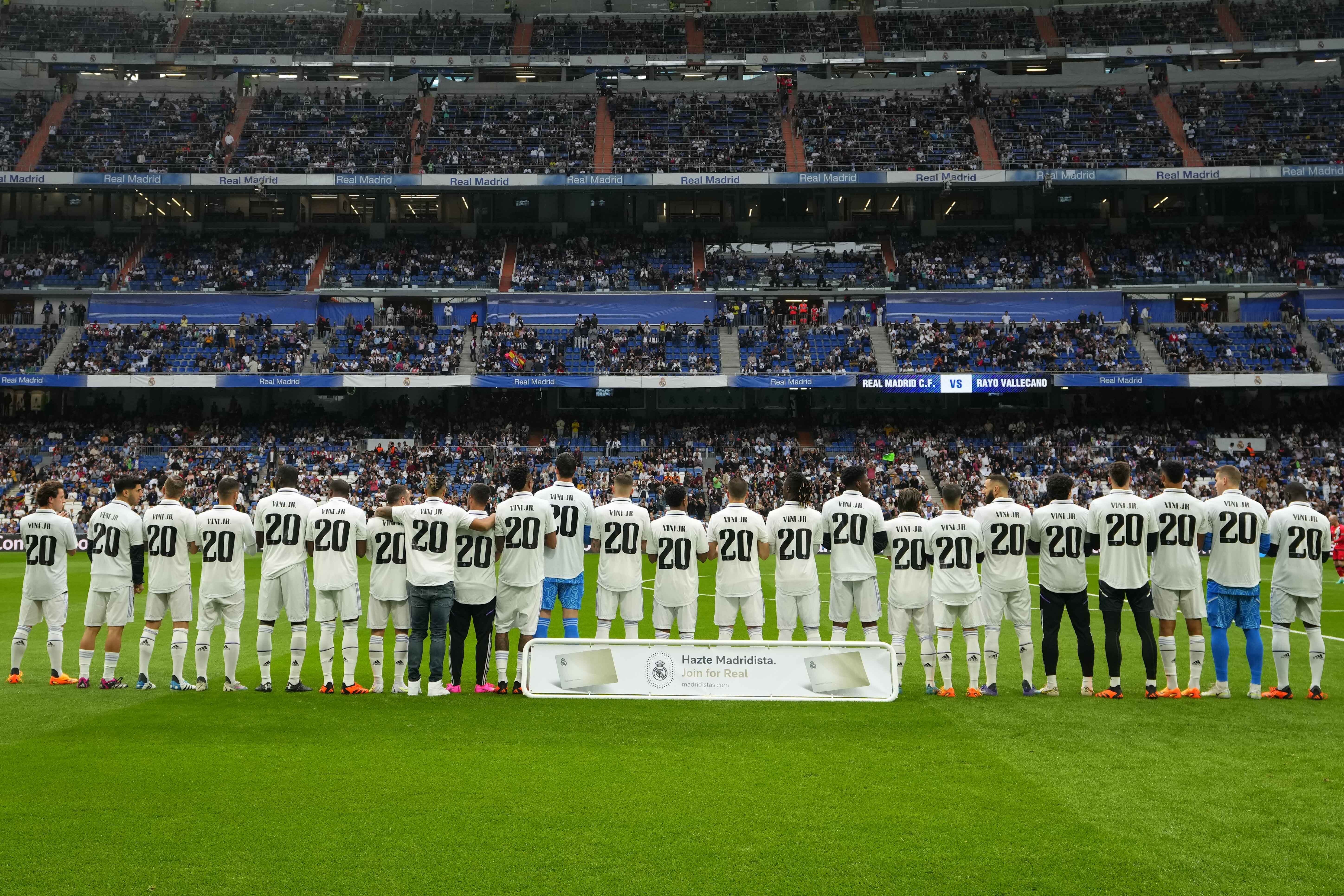 Players of Real Madrid wear jerseys with the name of team-mate Vinicius Junior before their LaLiga match on Wednesday