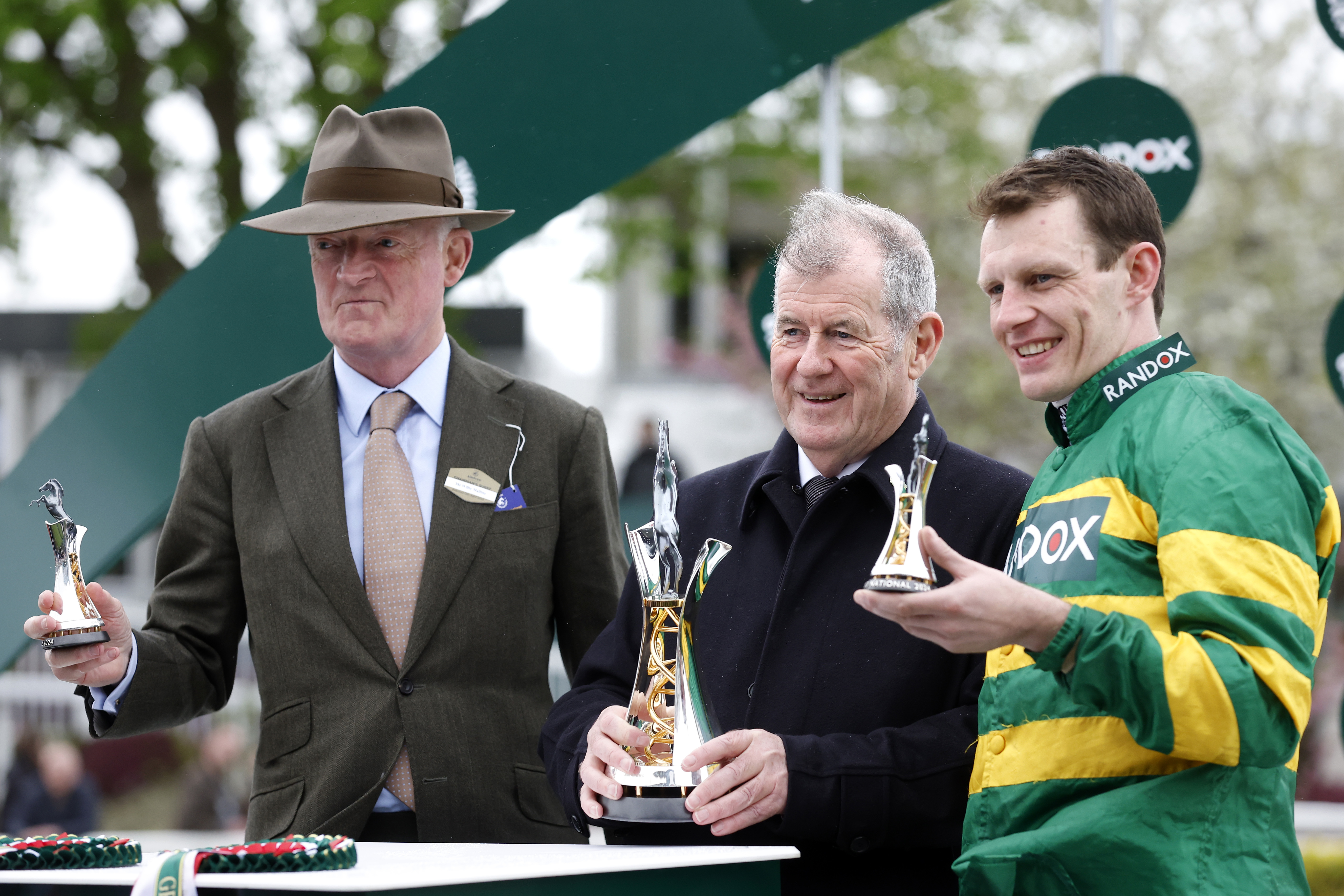 Willie Mullins, JP McManus and Paul Townend with their trophies