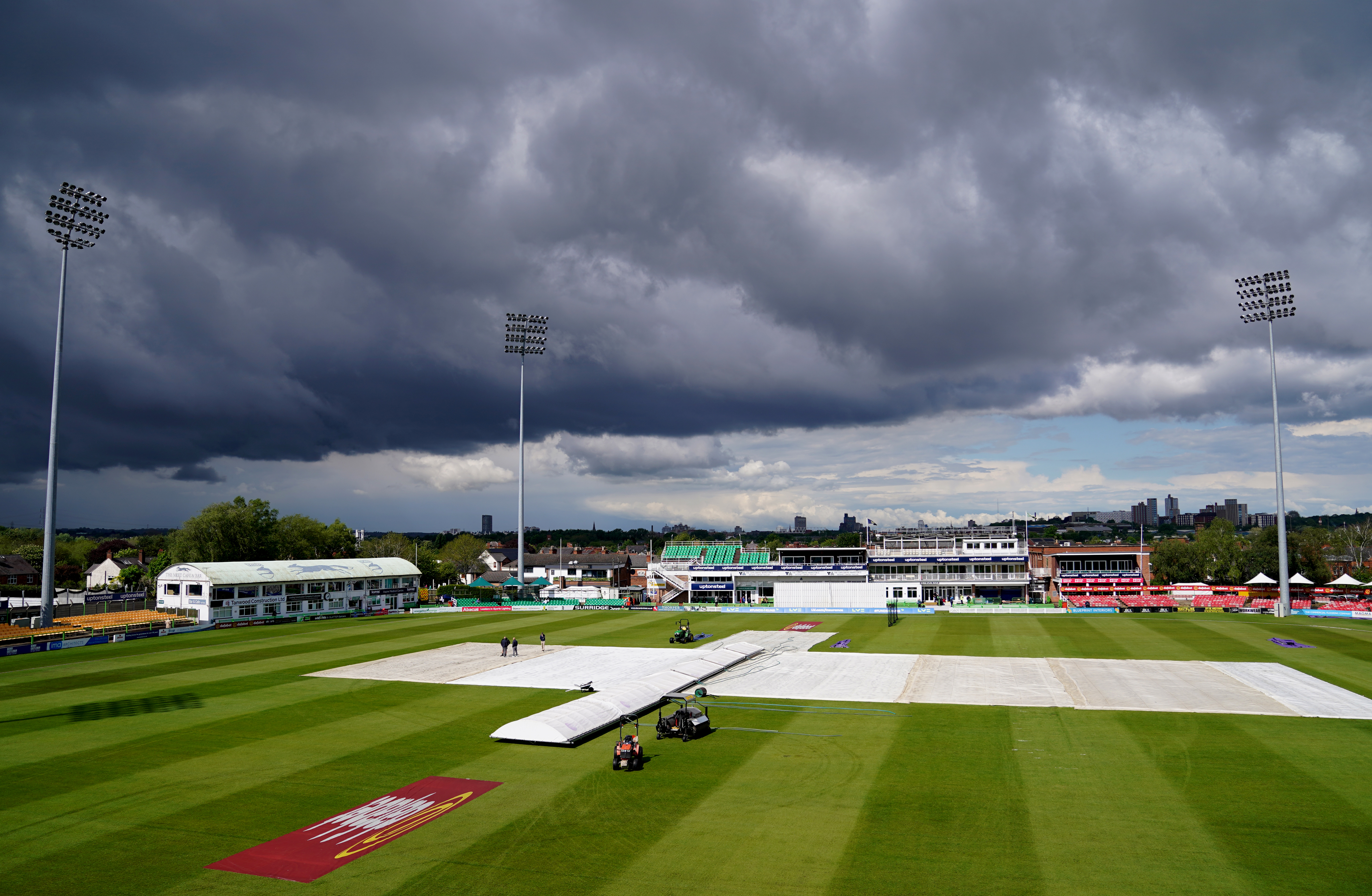 Rain clouds gather with the covers on at Leicestershire's game against Sussex