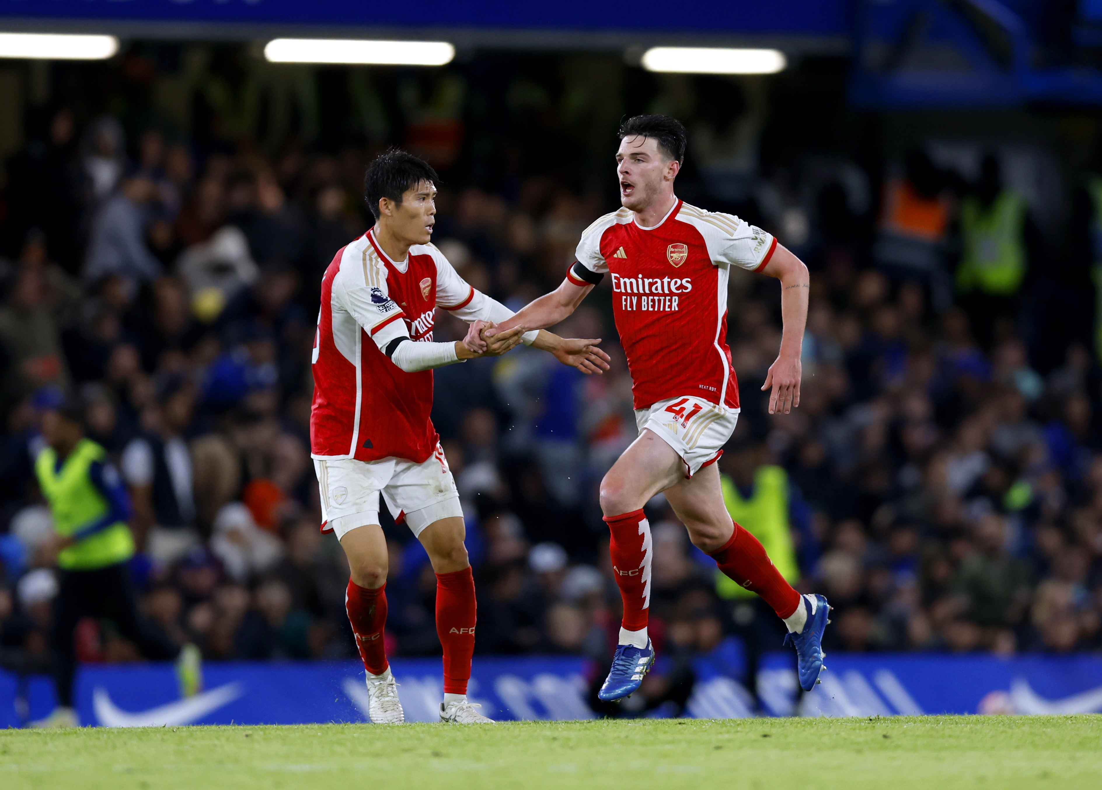 Arsenal come from two goals down to snatch a point at Chelsea
