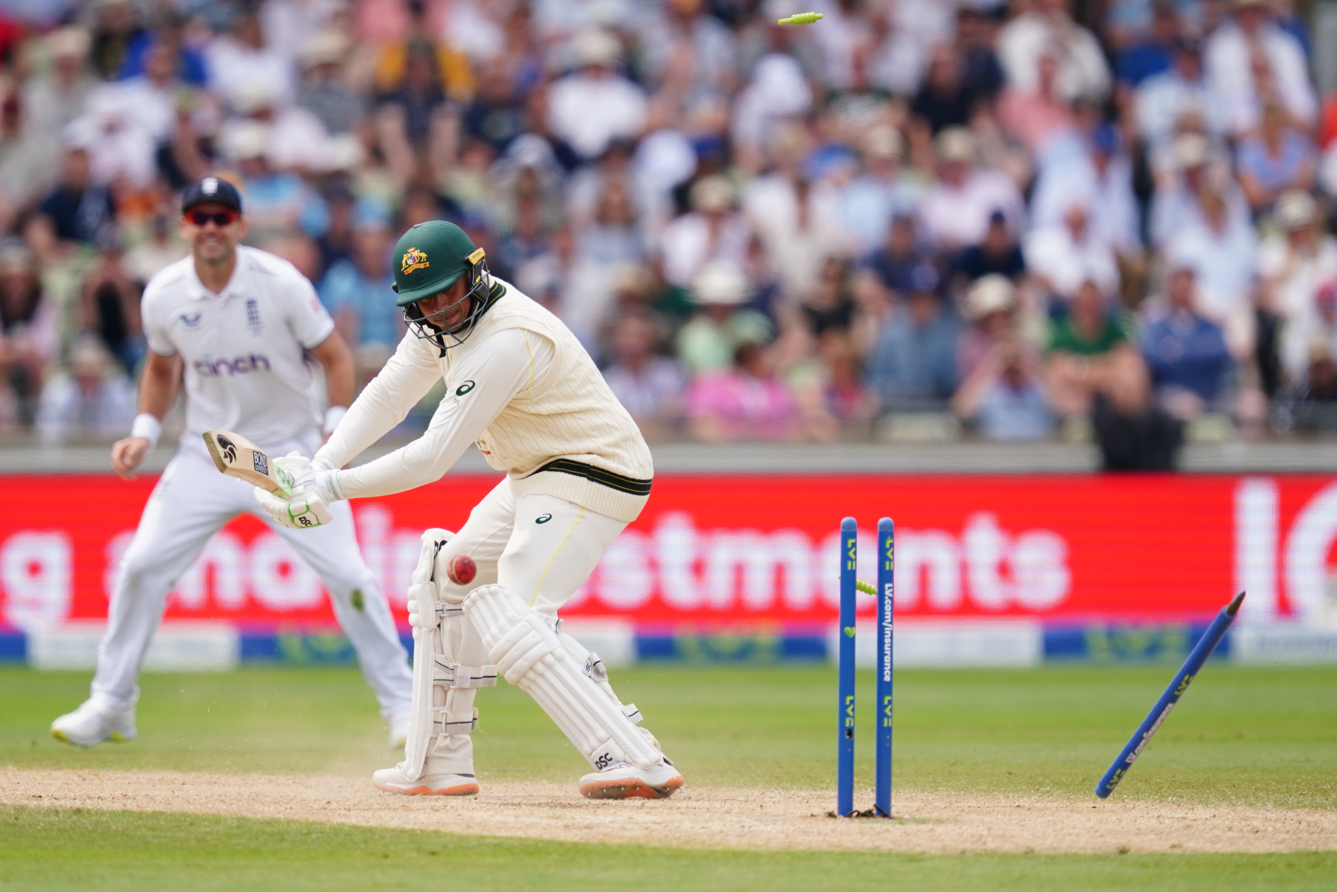 Usman Khawaja is bowled by Ollie Robinson