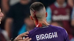 Fiorentina’s Cristiano Biraghi recieves treatment for a head injury after being struck by a plastic cup thrown from the crowd during the UEFA Europa Conference League Final at the Fortuna Arena, Prague. Picture date: Wednesday June 7, 2023.