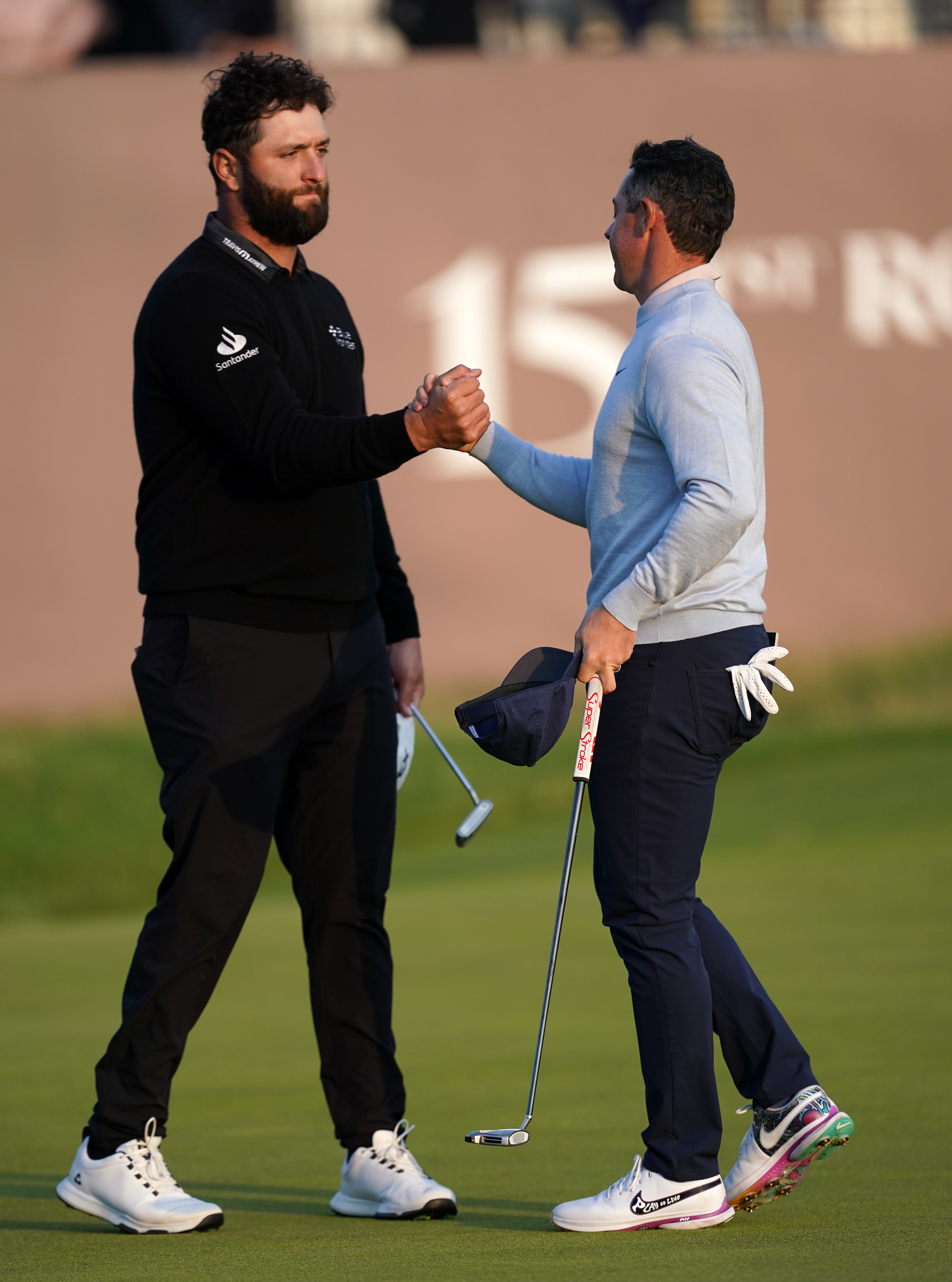 McIlroy (right) believes Jon Rahm (left) made a pragmatic decision to sign for the breakaway.