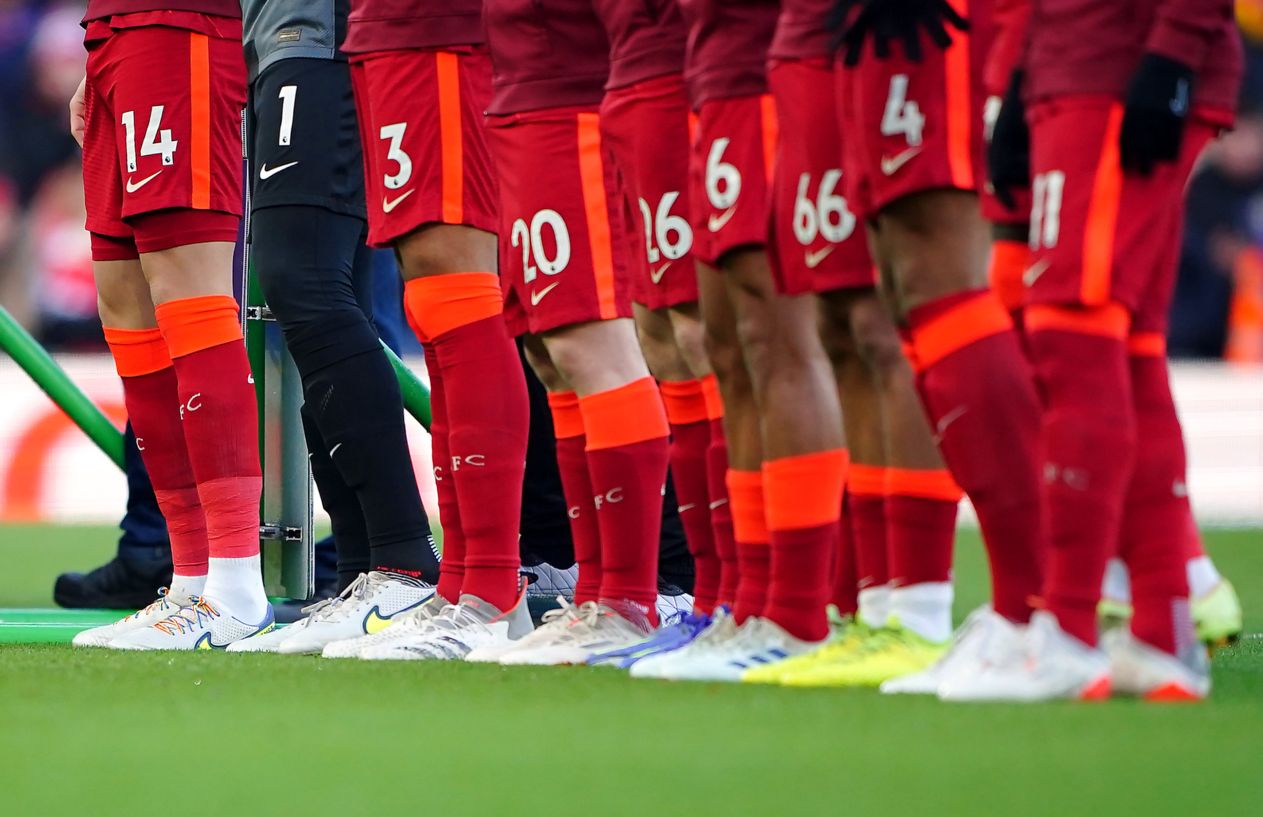 Liverpool captain Jordan Henderson (left) wearing Rainbow Laces to support the Stonewall campaign