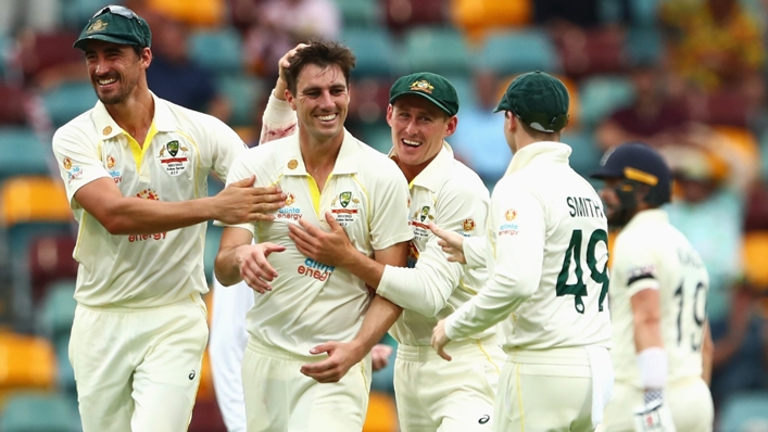 Pat Cummins celebrates one of his five wickets against England in the Ashes opener