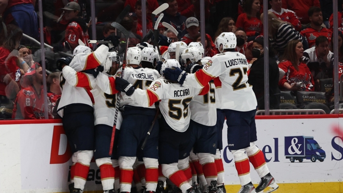 Carter Verhaeghe is mobbed after scoring the Florida Panthers' series-clinching goal against the Washington Capitals