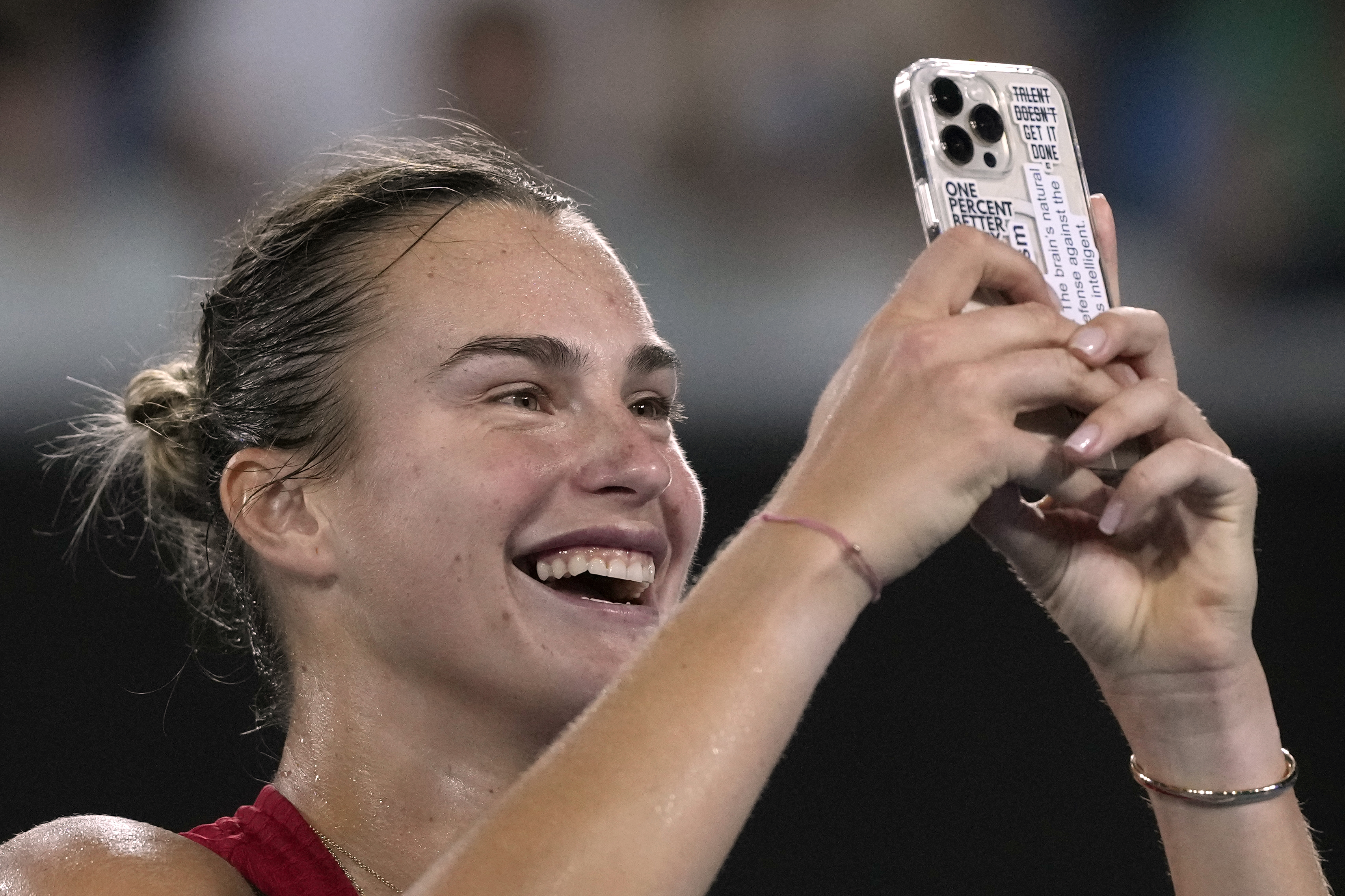 Aryna Sabalenka takes a selfie after beating Amanda Anisimova