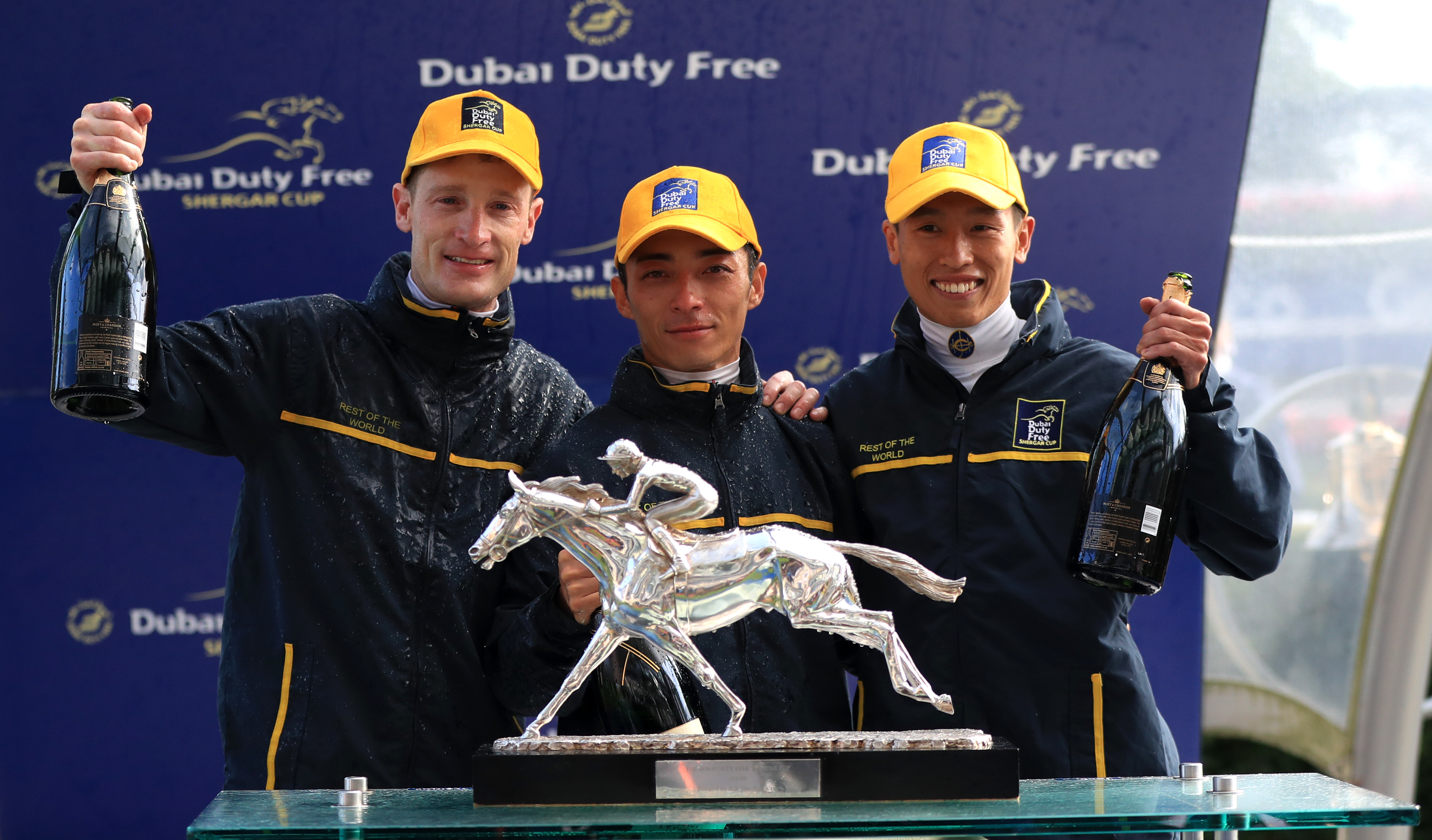 Rest of The World’s Vincent Ho (right), Yuga Kuwada (centre) and Mark Zahra (left) celebrate winning the Shergar Cup at Ascot in 2019
