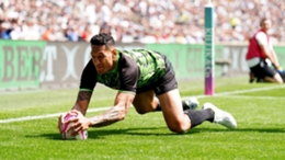 Israel Folau scores a try during the Killik Cup match at Twickenham