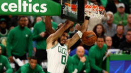Jayson Tatum dunks for two of his 31 points in Game 4 against the Miami Heat