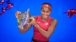 Coco Gauff poses with the US Open trophy (John Minchillo/AP)