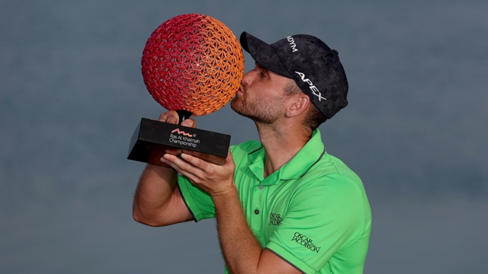 Daniel Gavins kisses the Ras Al Khaimah Championship trophy