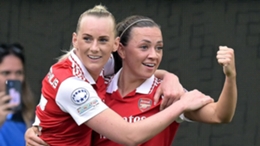 Stina Blackstenius and Katie McCabe celebrate Arsenal's equaliser at Wolfsburg