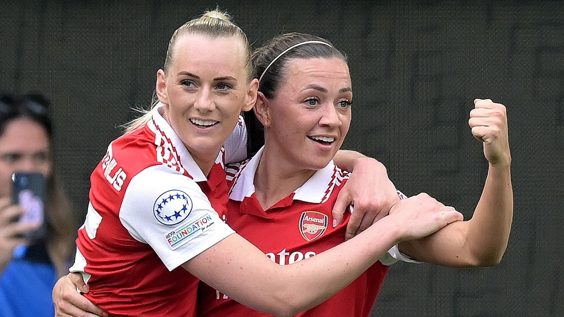 Stina Blackstenius and Katie McCabe celebrate Arsenal's equaliser at Wolfsburg